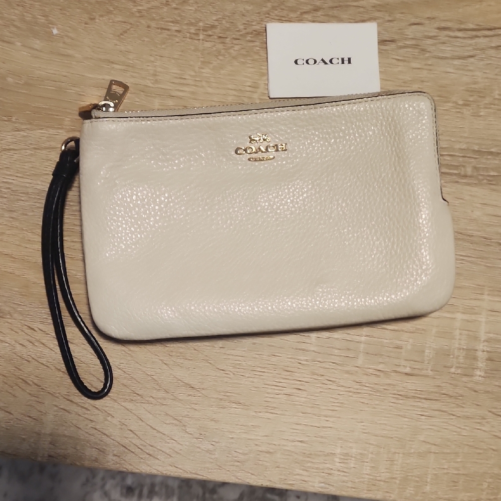 Coach Ivory Wristlet with Black Strap